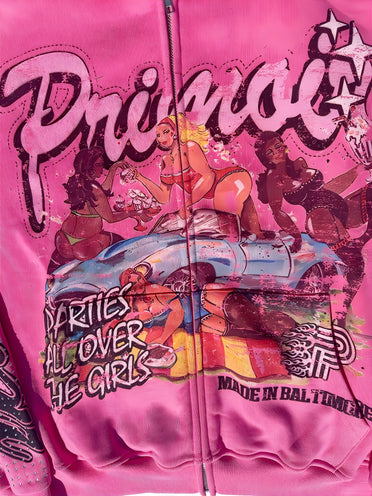 Close-up of colorful graphic on Primoir hoodie with women, car, and text design