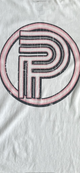Close-up of Primoir back logo in distressed pink and black print on heavyweight white tee