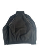 Back view of black Primoir USA+ jacket with white piping detail, laid flat on a white background