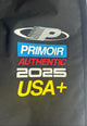 Close-up of Primoir USA+ 2025 patch on right leg of black pants, featuring, blue, red, white, and yellow embroidered branding.